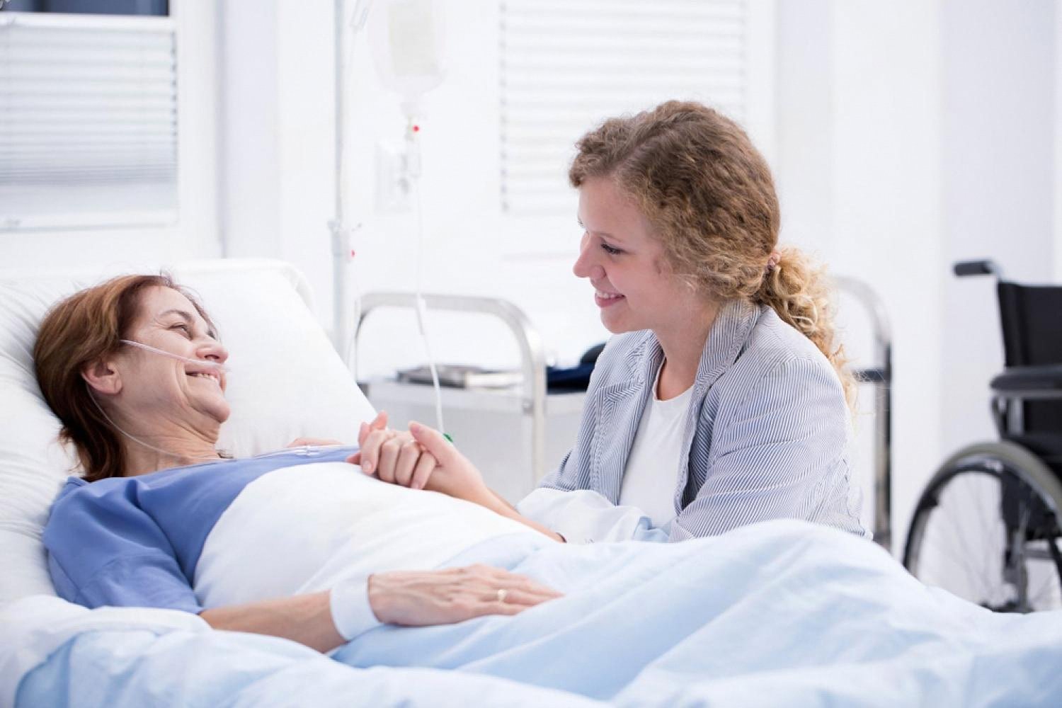 Patient recovering in a hospital bed after gallbladder removal surgery