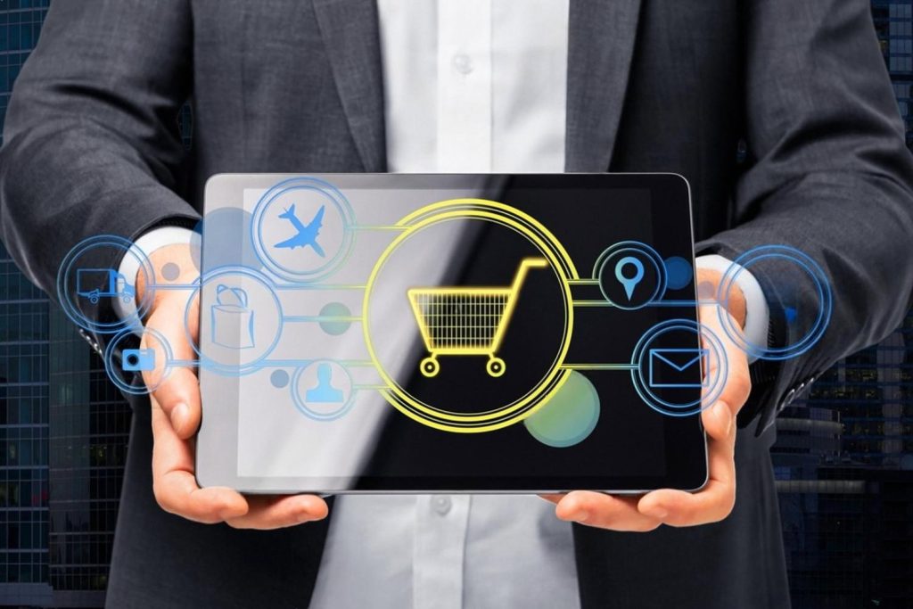 Businessman holding a tablet showing e-commerce and marketing icons for an event rental company in the UAE